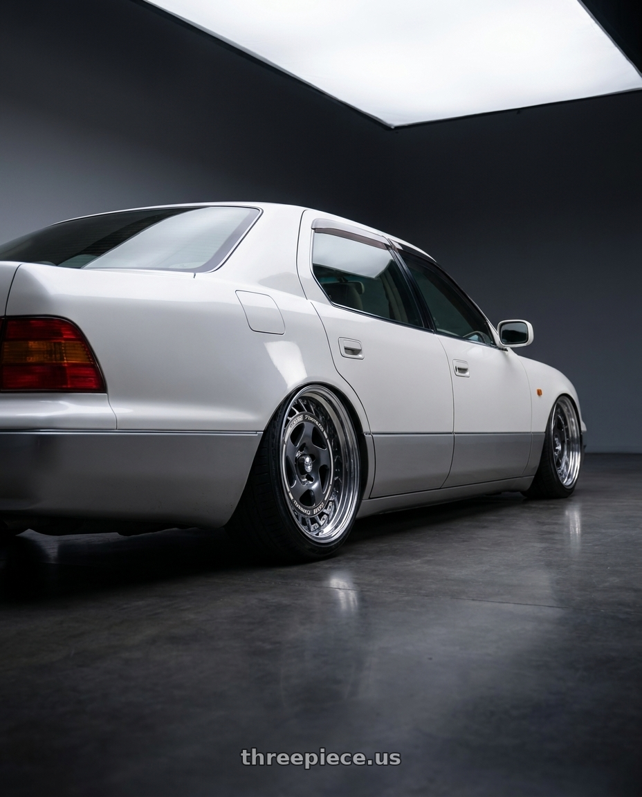 1999 Toyota Celsior with FORMULA AERO SPOKE 5x114.3 19X10+-14 NR Disk Titan Silver wheels rear three quarter view slight stretch tires