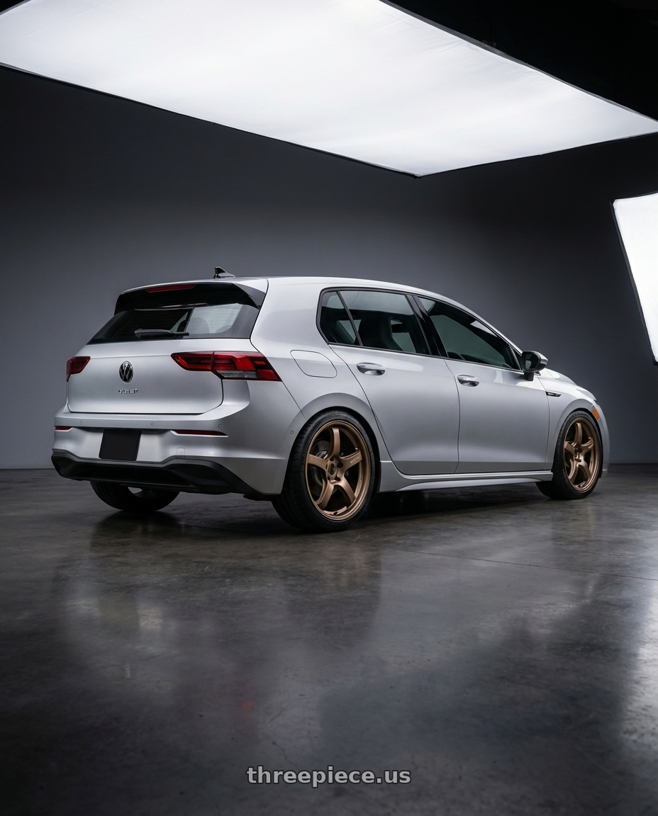2024 Volkswagen Golf R MK8 with Gram Lights 57CR 5x112 19x9.5+25 Bronze II wheels rear three quarter view square tires