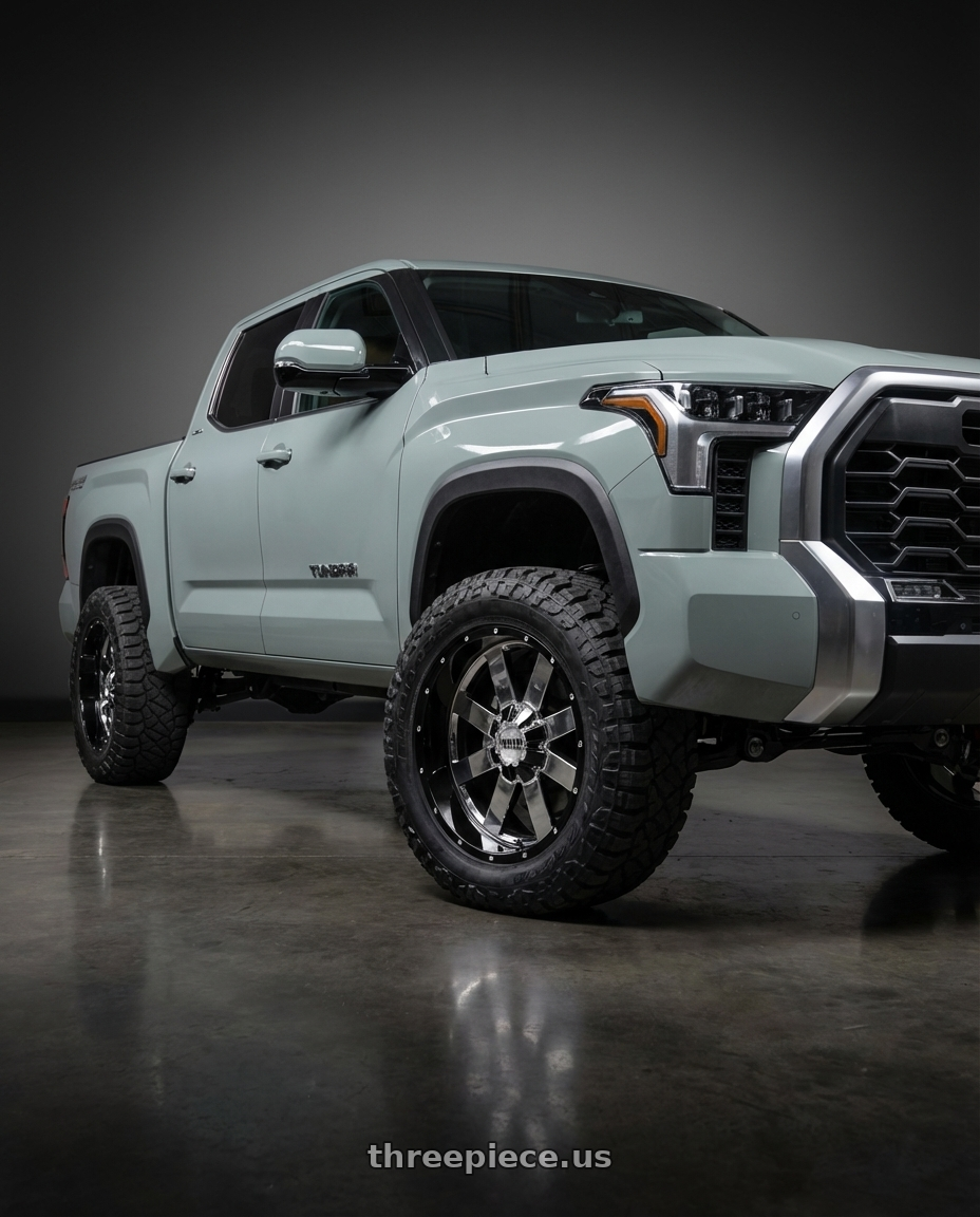 2024 Toyota Tundra with Moto Metal MO200 6X139.7 22X10 -18 CHROME CENTER GLOSS BLACK MILLED LIP wheels front three quarter view lifted stance