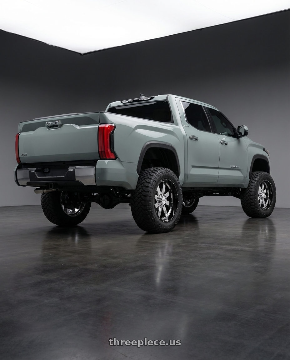 2024 Toyota Tundra with Moto Metal MO200 6X139.7 22X10 -18 CHROME CENTER GLOSS BLACK MILLED LIP wheels rear three quarter view meaty tires