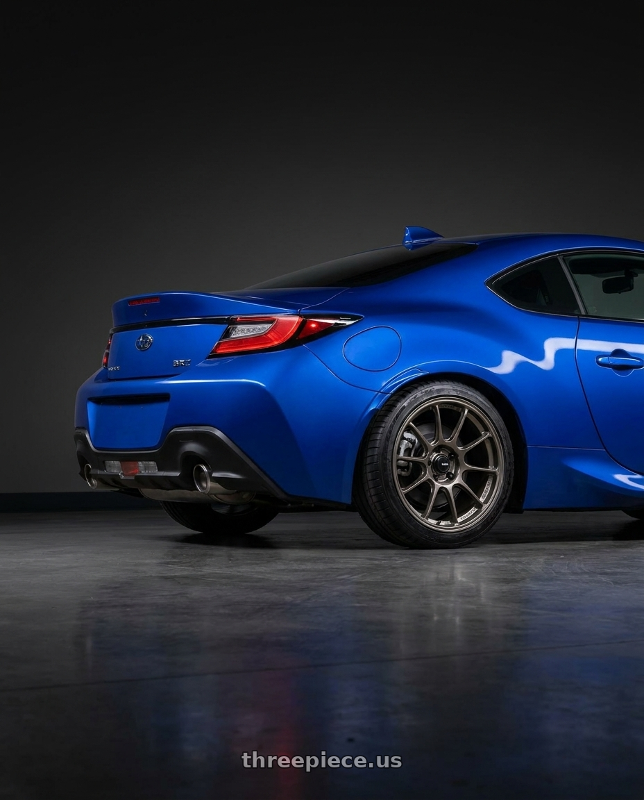 2025 subaru brz with Konig Ultragram 5x100 18x8.5+38 Carbon Bronze Metallic Knurled Bead wheels rear three quarter view square tires