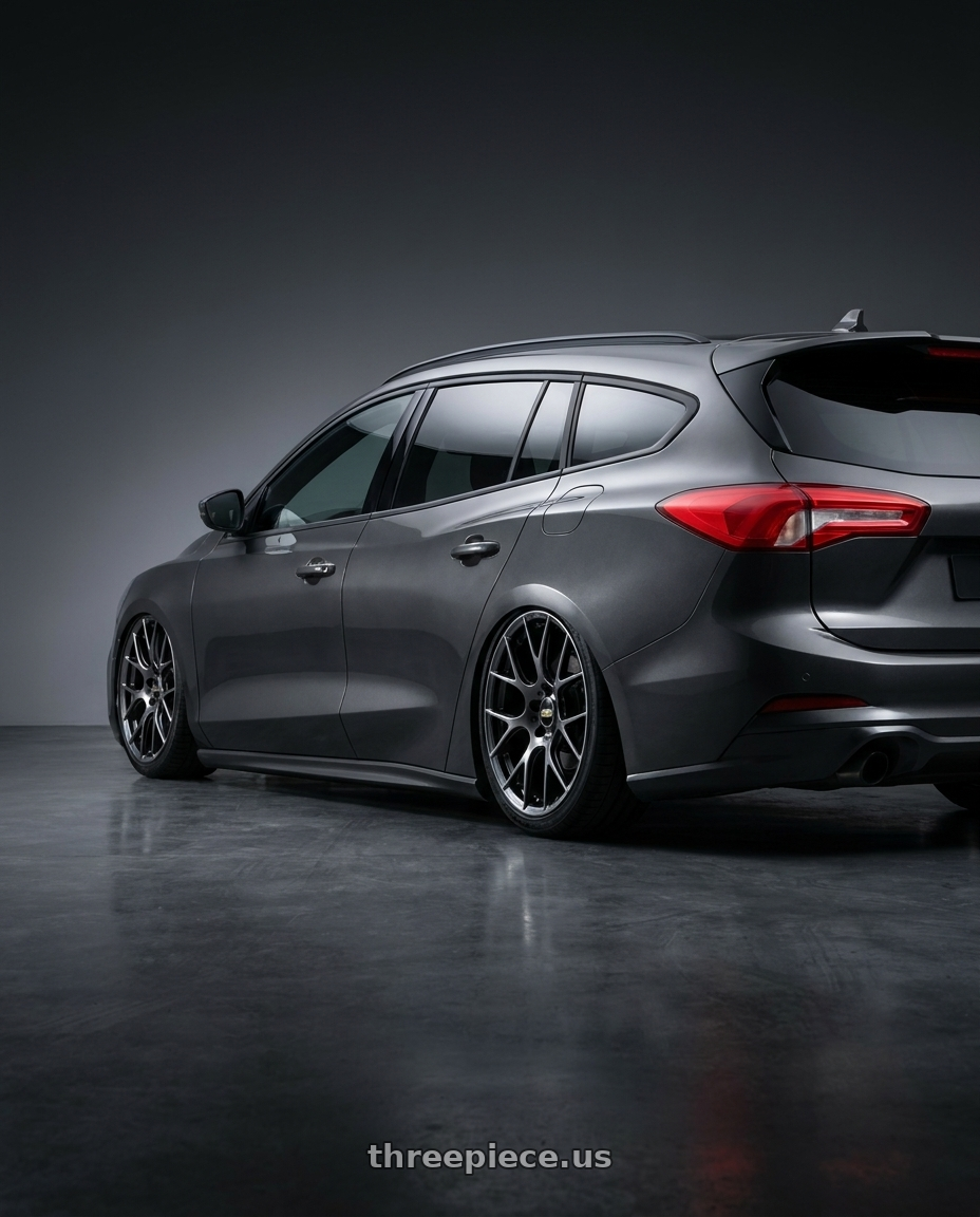 2021 Ford focus wagon st with BBS RE-V7 5x112 19x8.5 +43 Diamond Black wheels rear three quarter view slight stretch tires