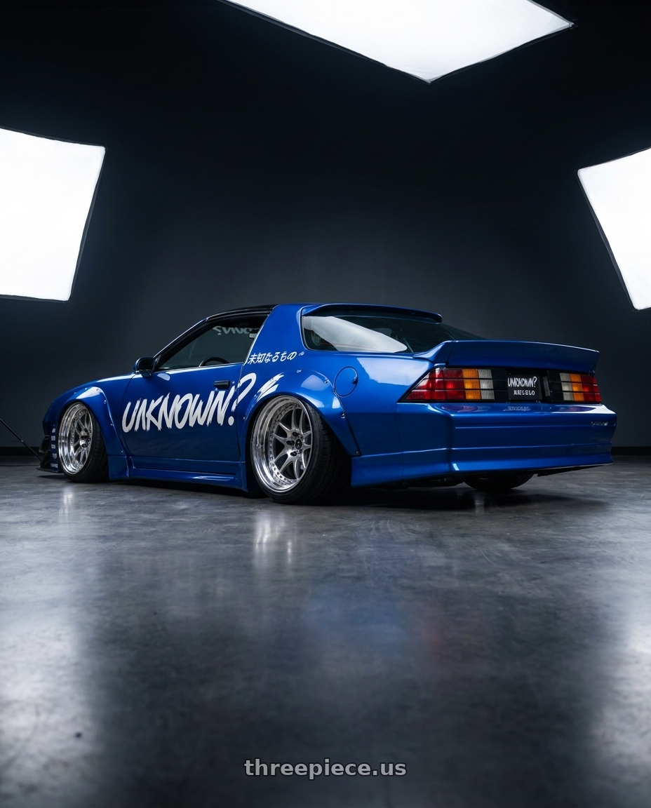 1992 Chevy Camaro D1SL with Work Emotion Cr 3P 5x100 18x10.5+7 R Disk Burning Silver wheels rear three quarter view slight stretch tires