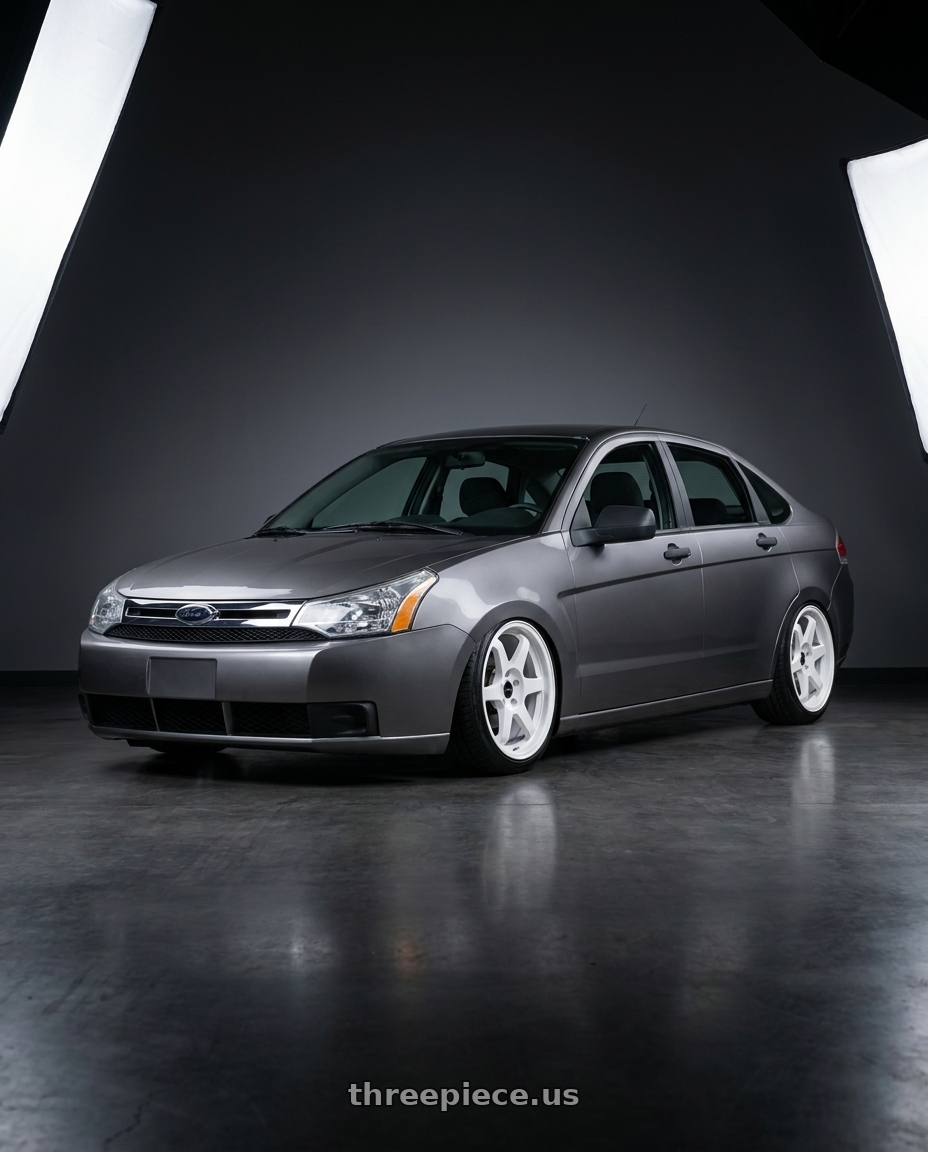 2008 Ford Focus with Vors TR37 4x108 17x8 +35 White wheels front three quarter view stanced stance