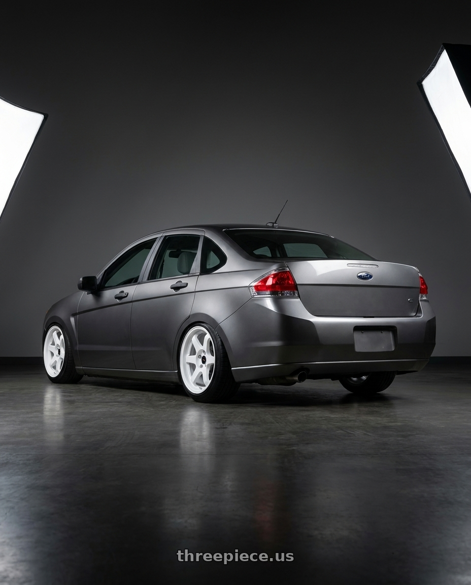 2008 Ford Focus with Vors TR37 4x108 17x8 +35 White wheels rear three quarter view slight stretch tires
