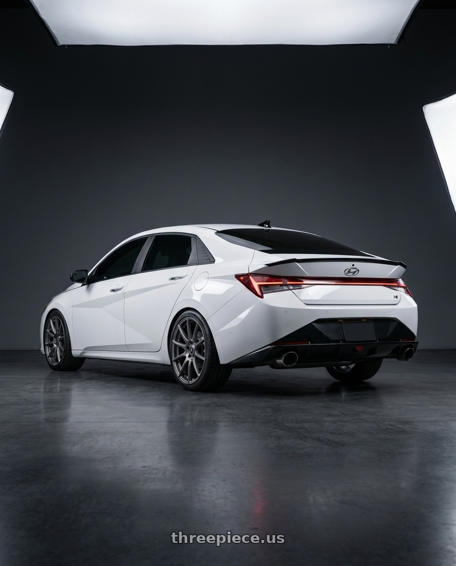 2024 Hyundai Elantra N with Forgestar CF10 5x114.3 19x9 +35 Gloss Anthracite wheels rear three quarter view square tires