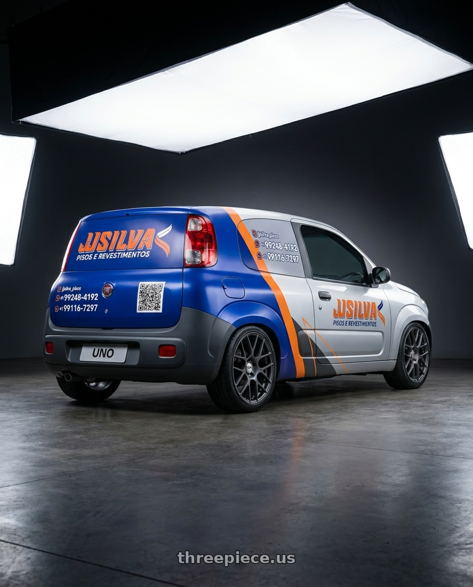 FIAT UNO 2015 2 PORTAS - ADESIVADA. PARACHOQUES CINZA ESCURO with TSW NURBURGRING 5X114.3 17X7.5 +45 MATTE GUNMETAL wheels rear three quarter view square tires