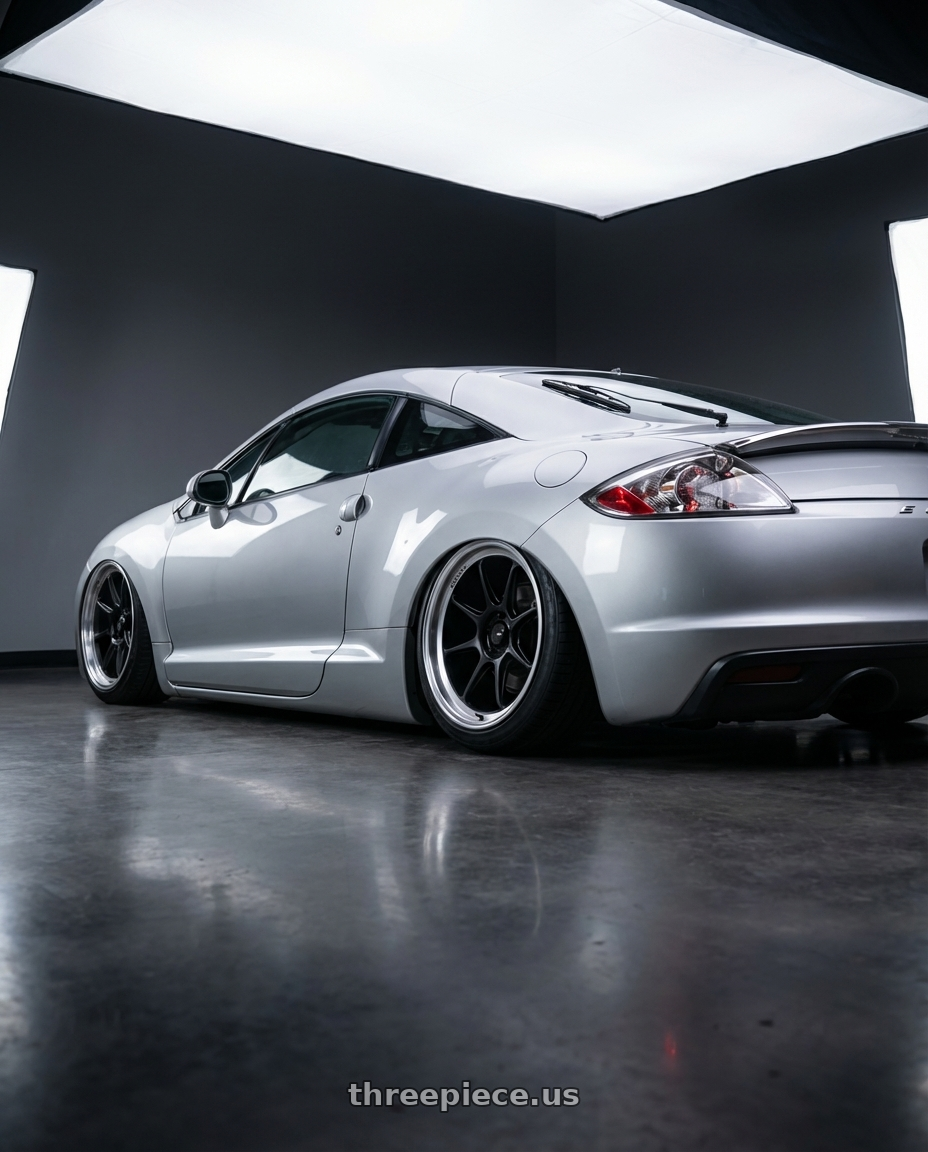 2010 Mitsubishi Eclipse with Konig Countergram 5x114.3 19x9.5+35 Matte Black / Matte Machined Lip wheels rear three quarter view slight stretch tires