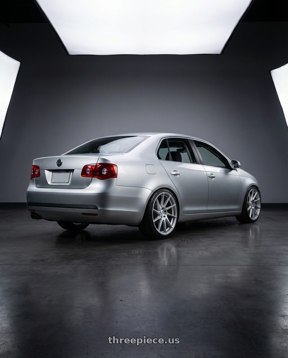 2009 Volkswagen Jetta GLI MK5 with Aodhan AH09 5x112 18x9.5 +35 Gloss Silver Machined Face wheels rear three quarter view square tires