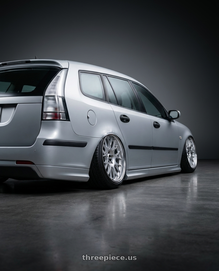 2006 Saab 9-3 Aero SportCombi with BBS CH-R 5x120 18x9 +44 Brilliant Silver Polished Rim Protector wheels rear three quarter view slight stretch tires