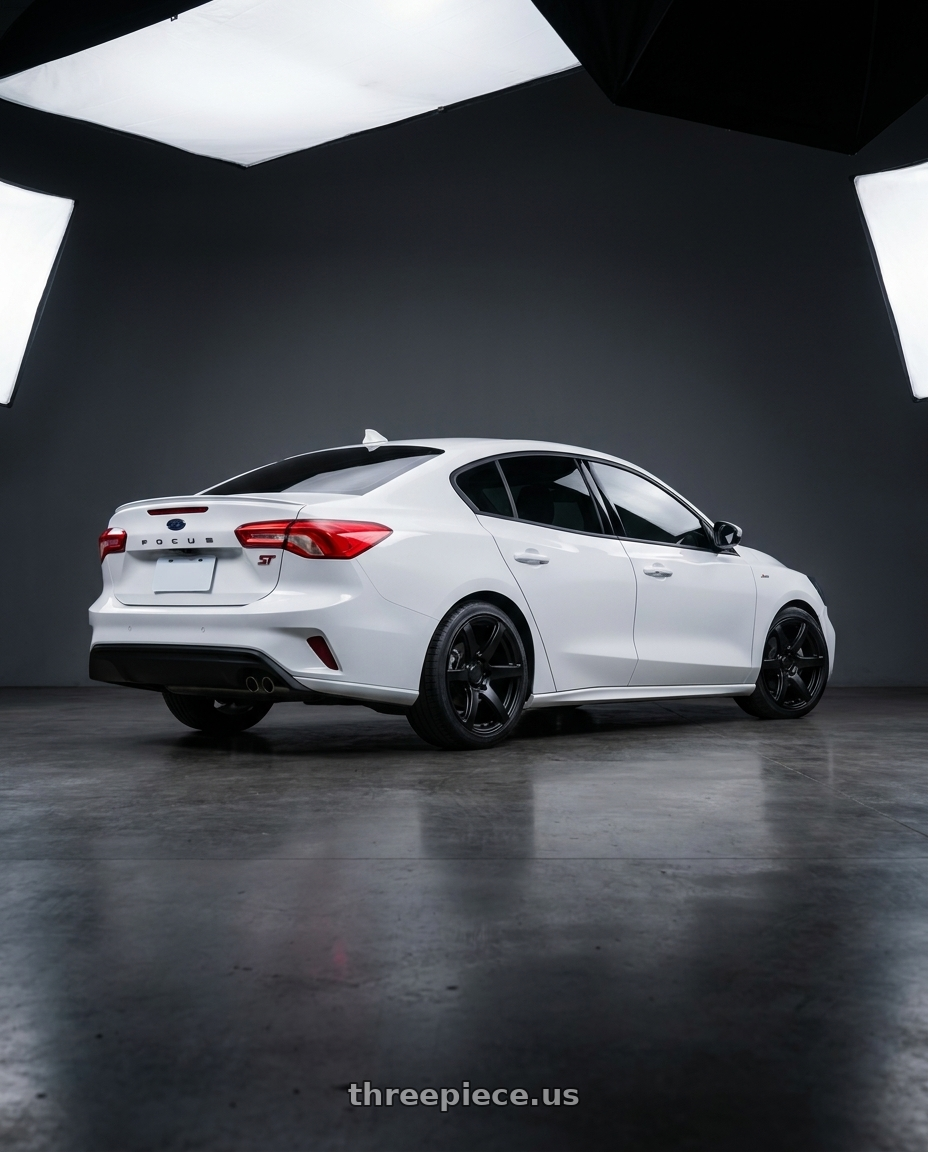 2020 focus st line 4D with Enkei Cyclone 6x135 18x9+12 Matte Black wheels rear three quarter view slight stretch tires