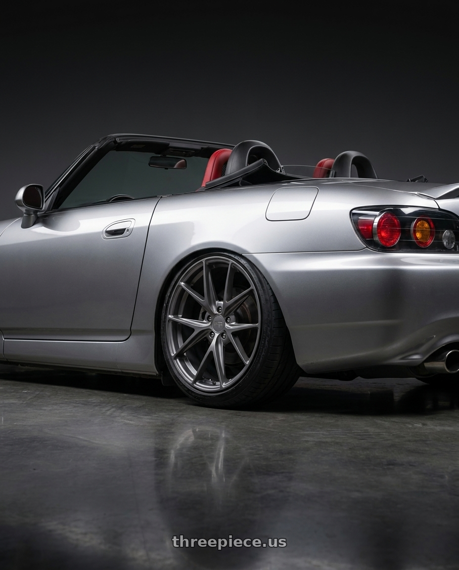 2009 Honda S2000 with Niche 1PC M116 MISANO 5X114.3 18X8 +40 MATTE GUN METAL wheels rear three quarter view slight stretch tires