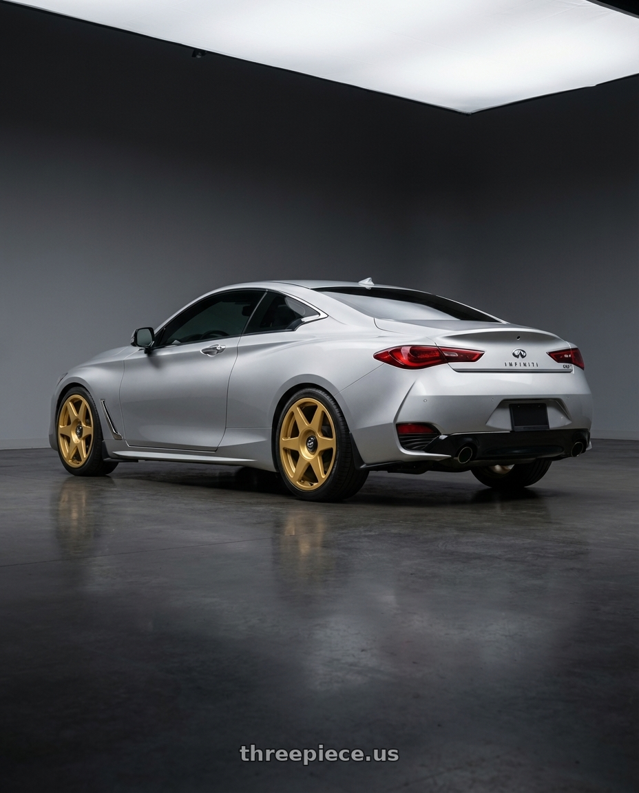 2020 Infiniti Q60 with fifteen52 TARMAC EVO 5x114.3 / 5x120 19x8.5 +35 GOLD (GLOSS GOLD) wheels rear three quarter view square tires