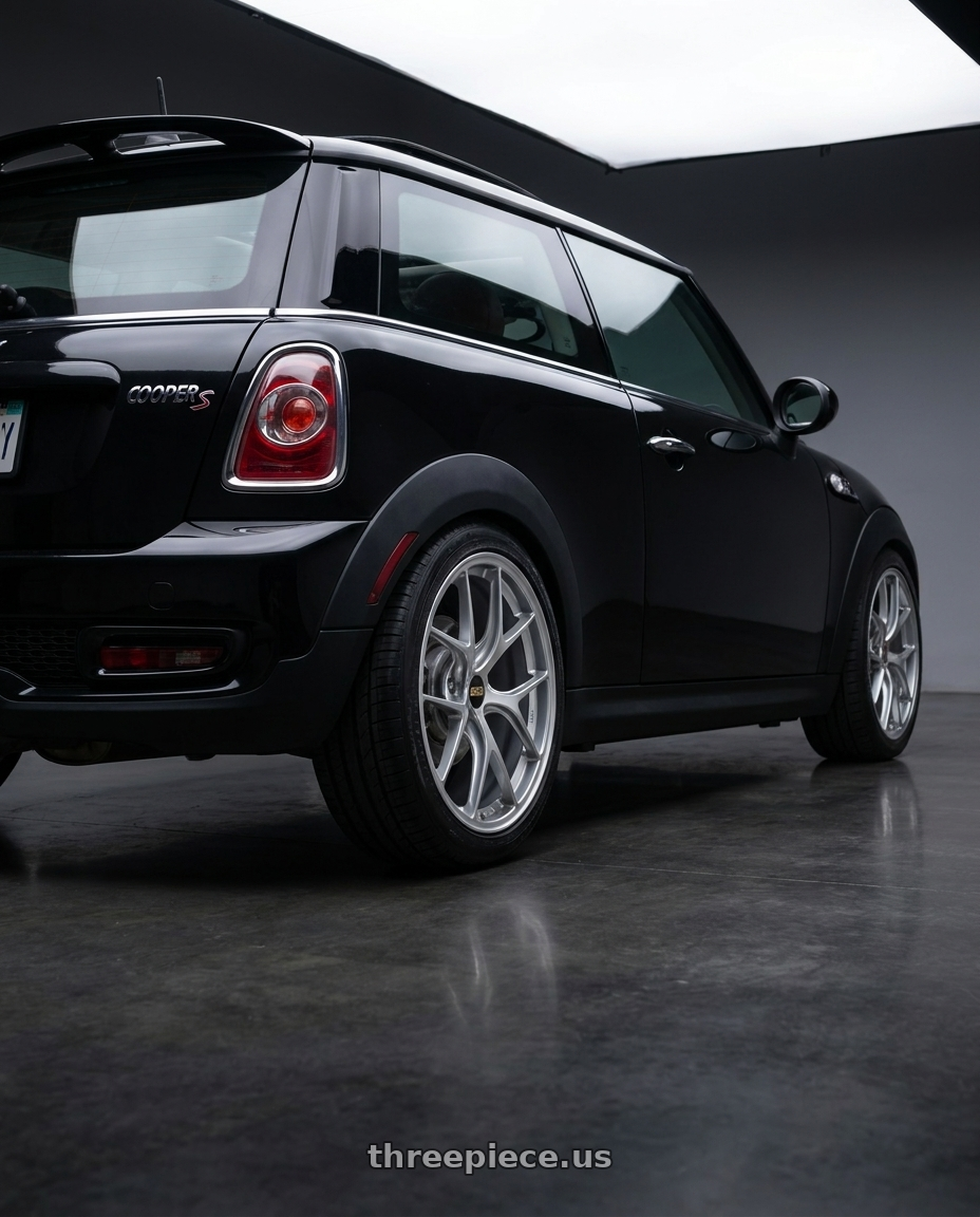2010 mini cooper S with BBS RI-D 5x114.3 20x9 +38 Diamond Silver wheels rear three quarter view square tires