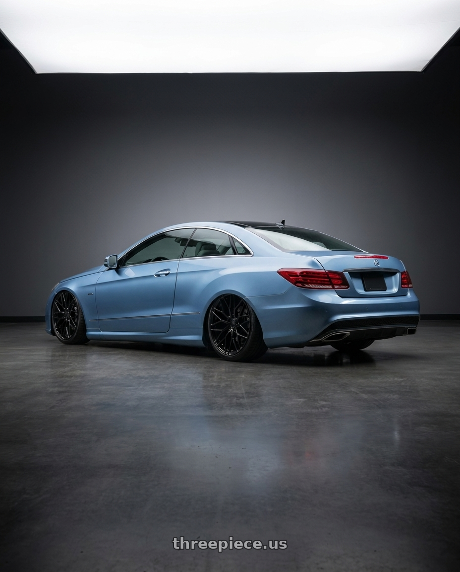 2014 Mercedes-Benz E-Class Coupe C207 with Avant Garde Wheels M520R 5X112 19x8.5 +35 Gloss Black wheels rear three quarter view slight stretch tires