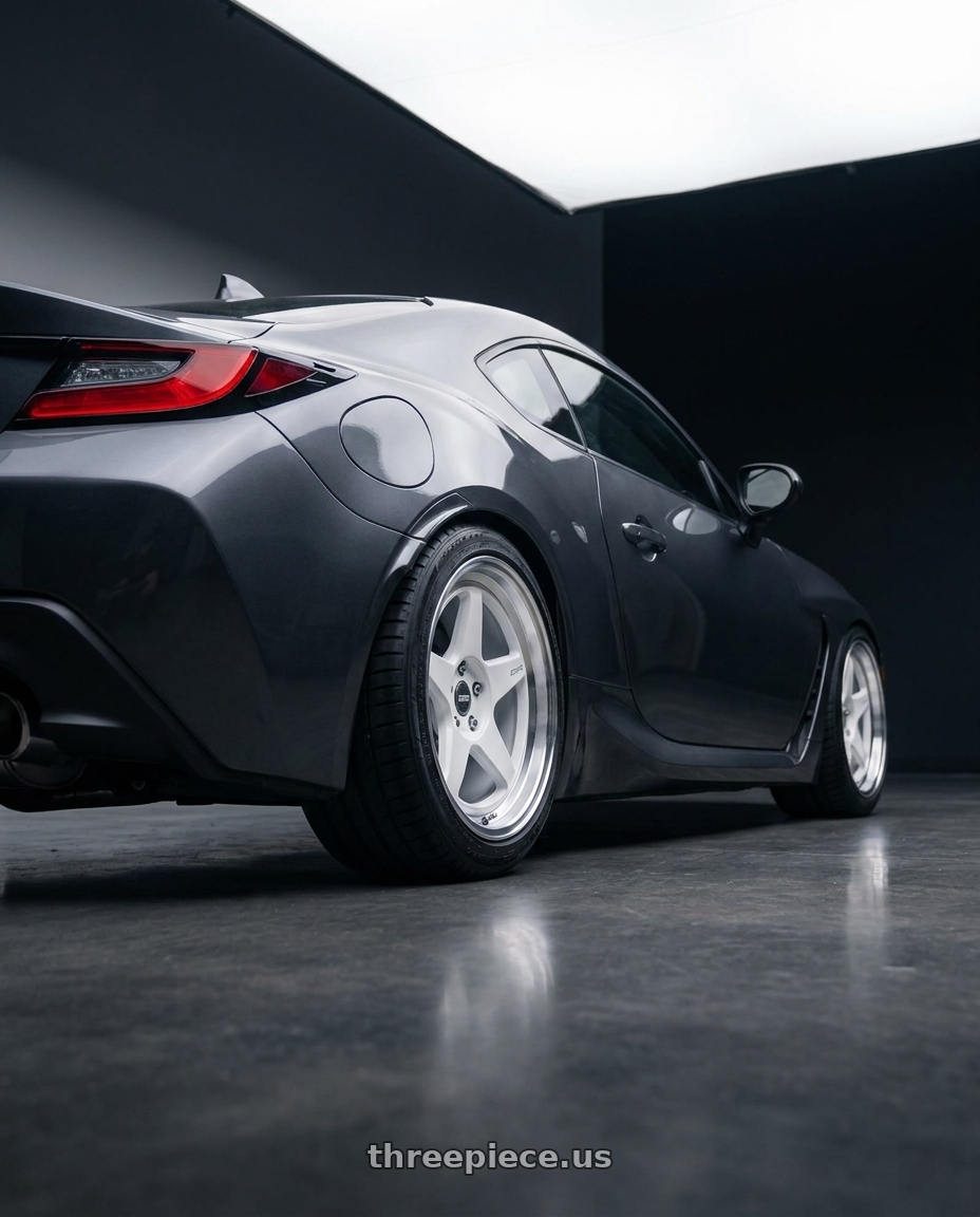 2023 Subaru BRZ premium Magnetite grey  with ESR Wheels CR SERIES CR5 5x100 18x9.5 +35 Gloss White wheels rear three quarter view square tires