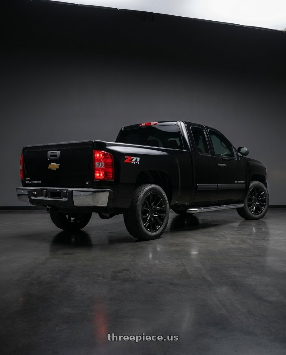 2012 Chevrolet Silverado with OE Wheels CA90 6x139.7 20x9+28 Black wheels rear three quarter view square tires