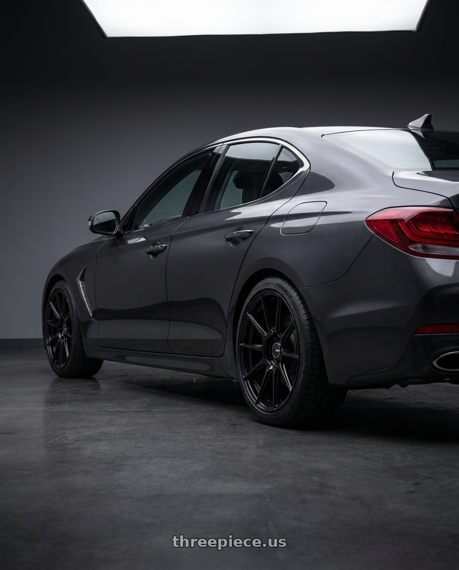 2019 Genesis G70 with Enkei TS10 5x114.3 18x8.5+35 Black wheels rear three quarter view slight stretch tires