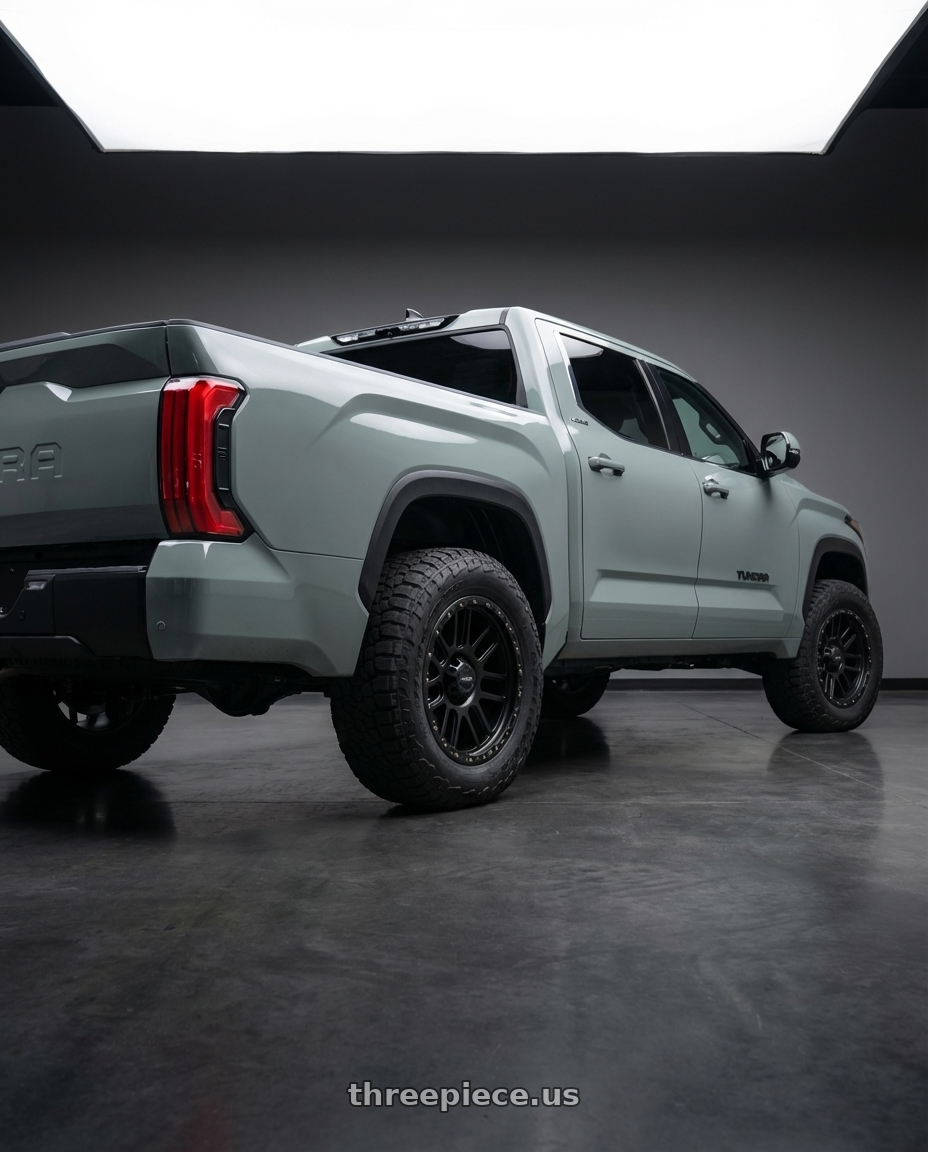 2024 Toyota Tundra with Vision Off-Road 111 Nemesis 6x139.7 20x9+10 Matte Black wheels rear three quarter view meaty tires