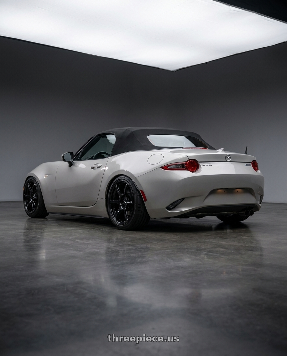 2021 Mazda MX-5 Miata ND with Advan RGIII 5x114.3 17x9.0+45 Gloss Black wheels rear three quarter view slight stretch tires