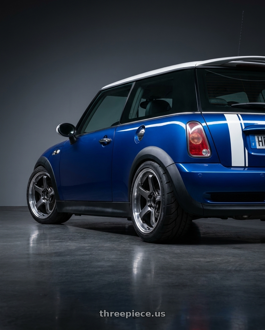 Mini r53 2005 with Advan Racing GT BEYOND 4x100 17x7.5 +32 MACHINING & HYPER PLATINUM BLACK wheels rear three quarter view meaty tires