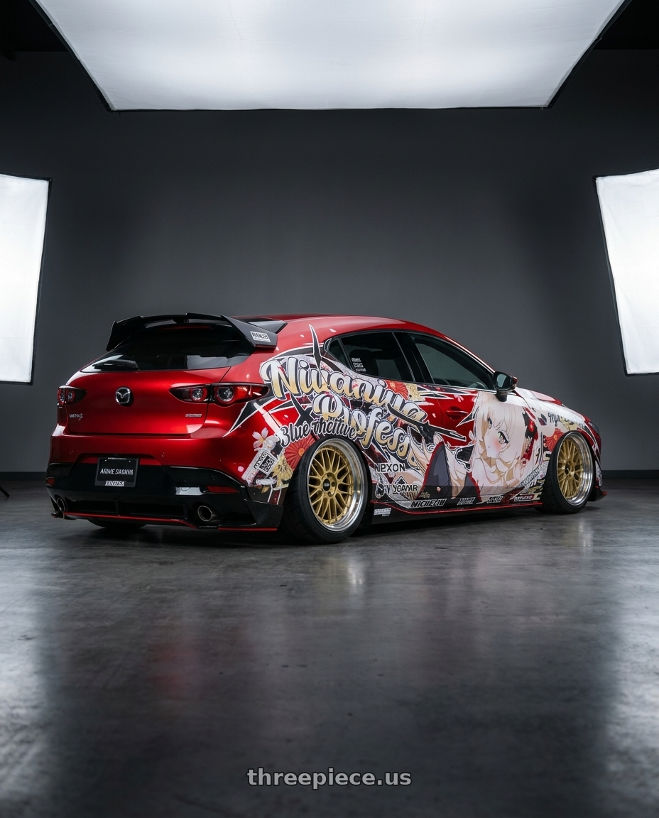 2026 mazda 3 with BBS LM 5x114.3 17x7.5+38 Gold wheels rear three quarter view meaty tires