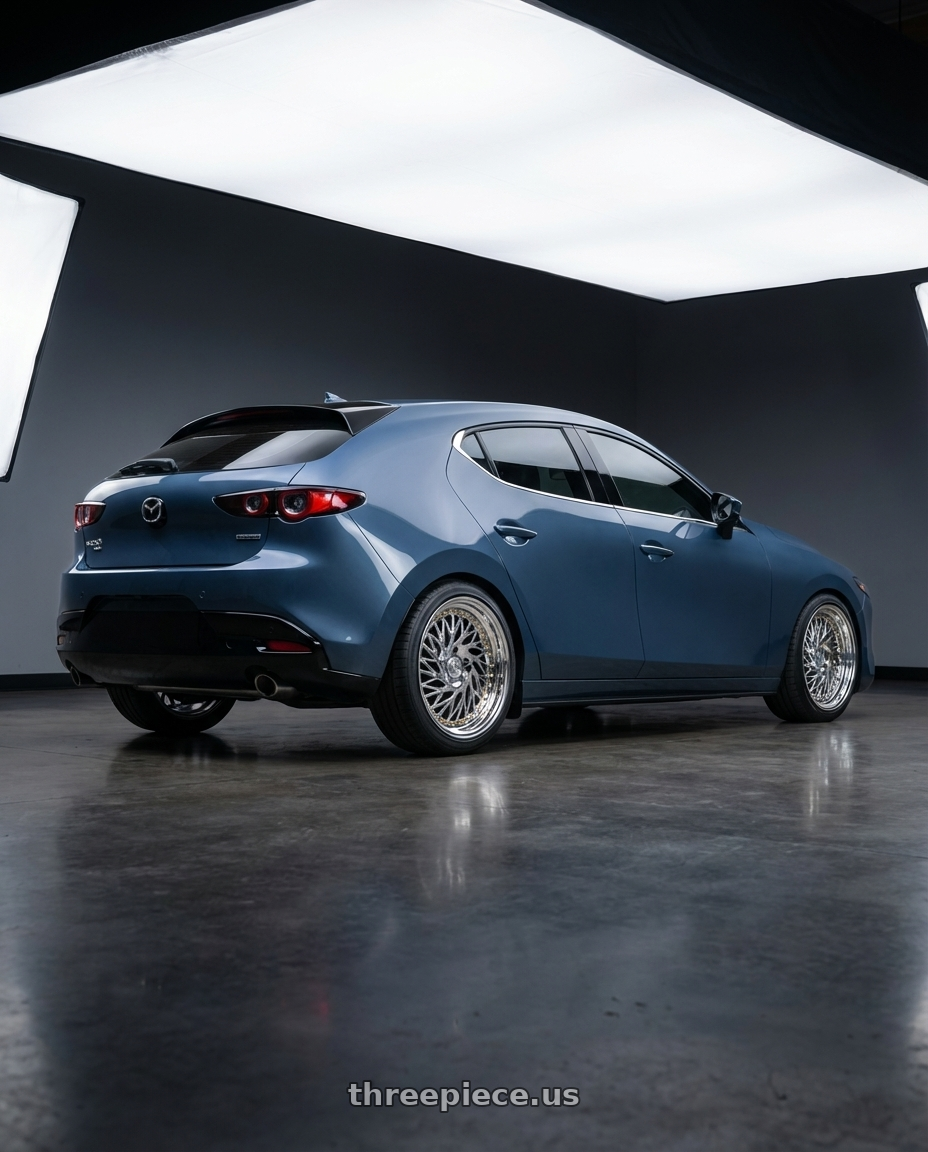 2023 Mazda Mazda3 Turbo with Aodhan DS03 5x114.3 18x9.5 +30 Vacuum Chrome w/Gold Rivets wheels rear three quarter view square tires