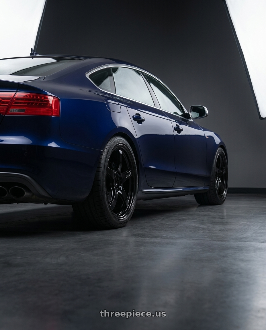 2014 Audi S5 B8 with Gram Lights 57CR 5x112 19x9.5+25 Glossy Black wheels rear three quarter view square tires