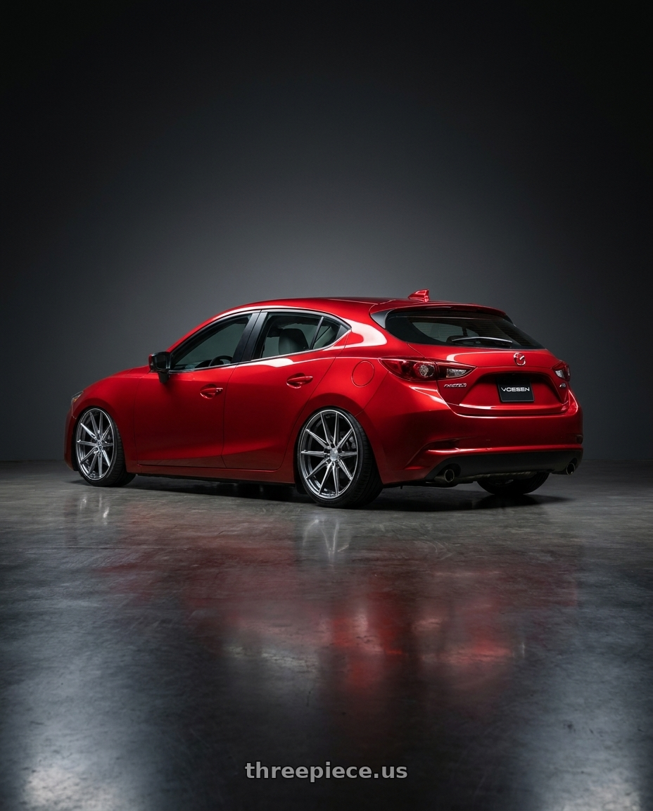 2018 Mazda 3 with Vossen HF-3 5x114.3 19x9.5 +40 Gloss Graphite Polished wheels rear three quarter view slight stretch tires
