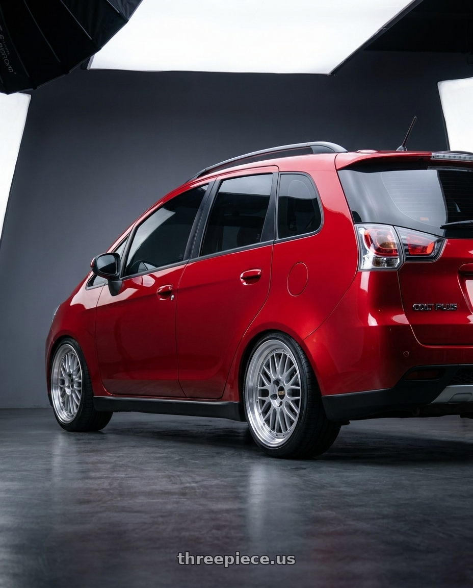2025 mitsubishi colt plus Red with BBS LM 5x114.3 17x7.5+38 Diamond Silver wheels rear three quarter view slight stretch tires