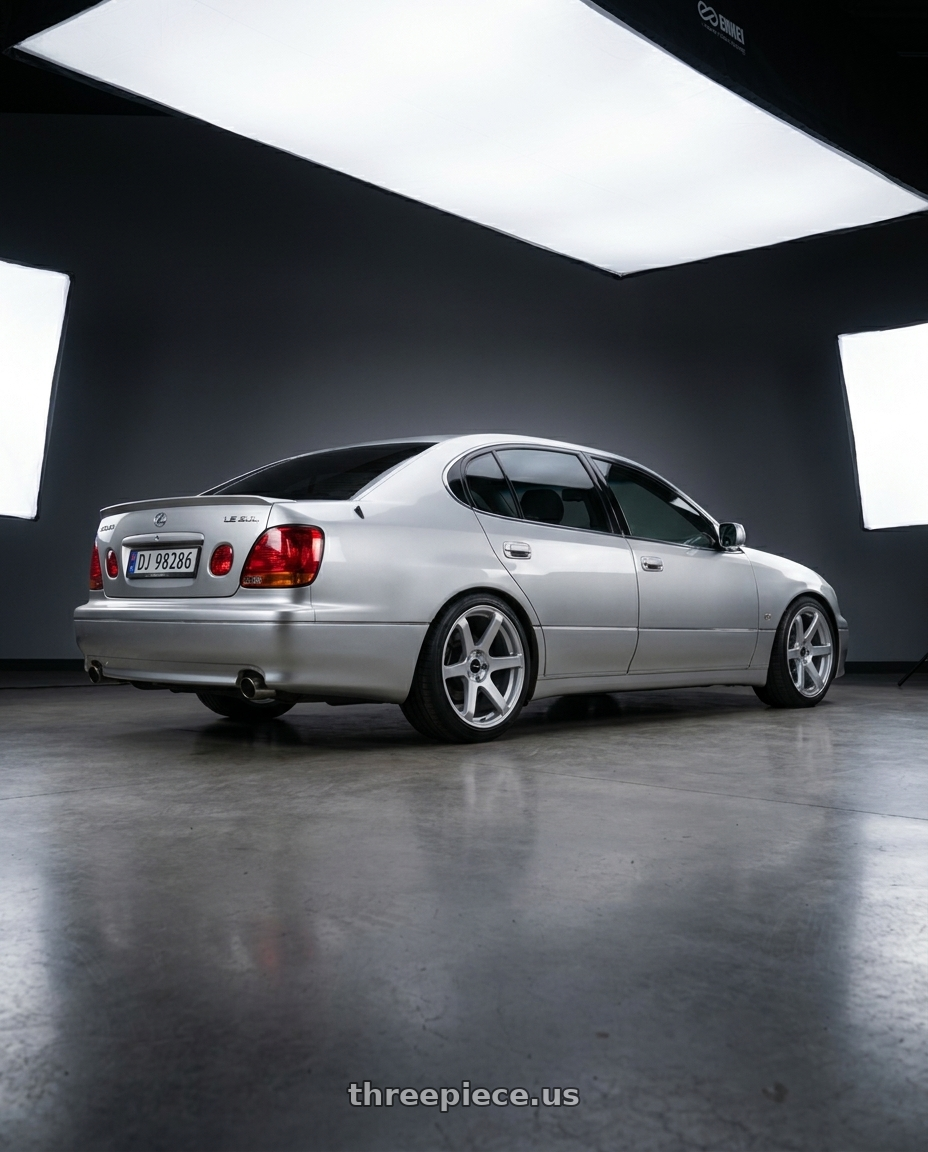2001 Lexus gs300 with Enkei T6S 5x114.3 18x8.5+35 Matte Silver wheels rear three quarter view square tires