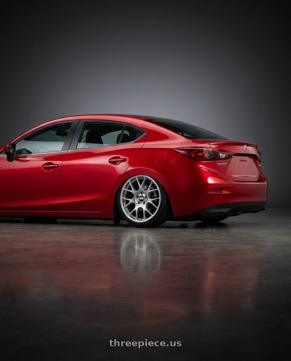 2016 Mazda 3 with BBS CH-R 5x114.3 19x8 +38 Brilliant Silver Polished Rim Protector wheels rear three quarter view slight stretch tires