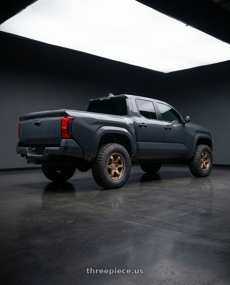 toyota tacoma 4th gen 2024 sr rwd with Motegi MR150 TRAILITE 6X139.7 17X8.5 +0 MATTE BRONZE wheels rear three quarter view meaty tires