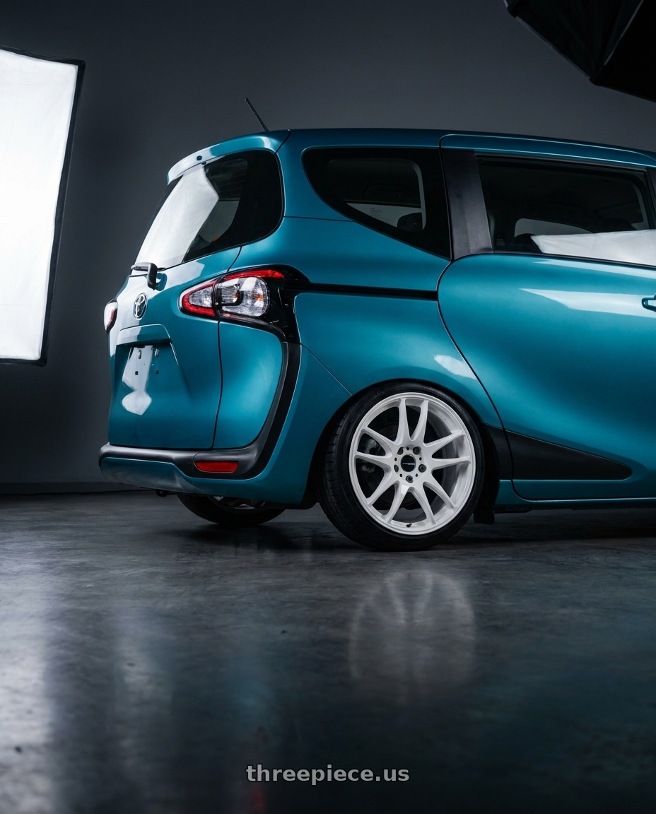 2020 toyota sienta  with Work Emotion CR Kiwami wheels rear three quarter view square tires
