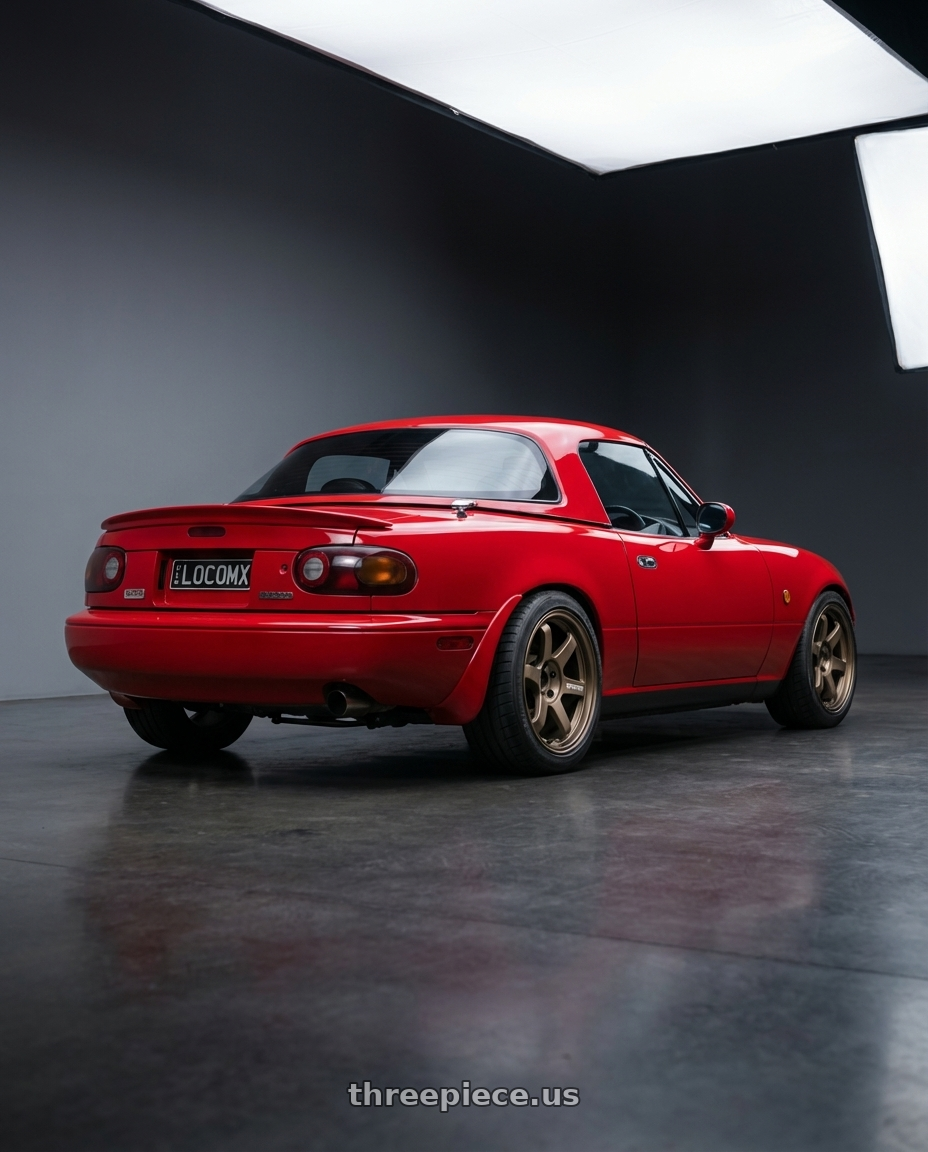 Mazda mx5 1990 with Volk Racing TE37 Ultra M Spec 5x112 19x9.5+23 19x10.5+35 Bronze Almite Toyota Supra MK5 Spec wheels rear three quarter view square tires