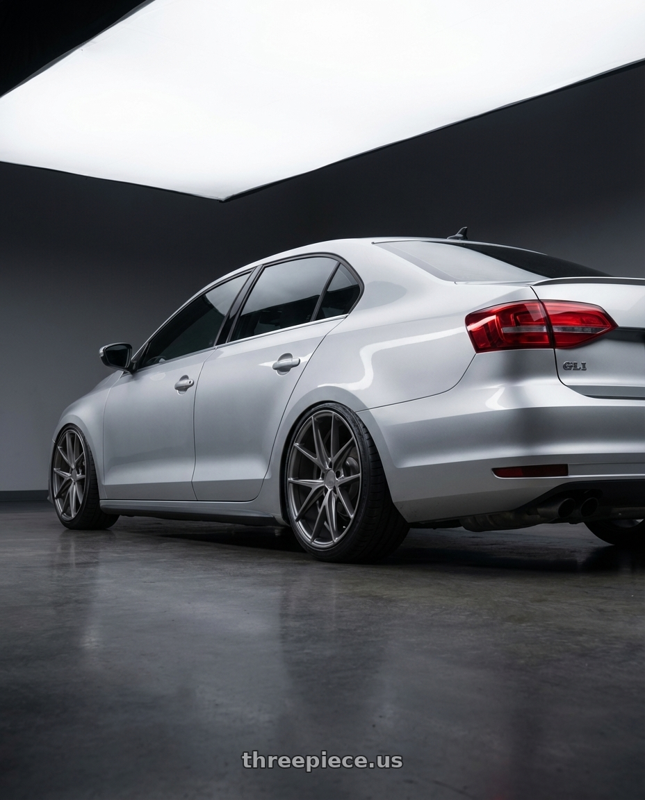 2016 Volkswagen Jetta GLI MK6 with Niche 1PC M116 MISANO 5X112 18X8 +42 MATTE GUN METAL wheels rear three quarter view slight stretch tires