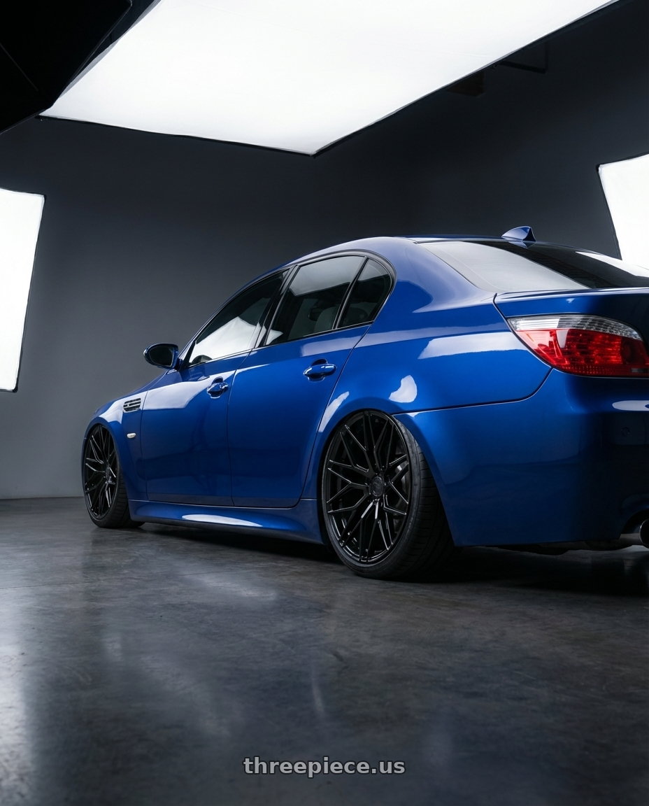 2010 BMW M5 E60 with Avant Garde Wheels M520R 5X120 20x9 +38 Gloss Black wheels rear three quarter view slight stretch tires