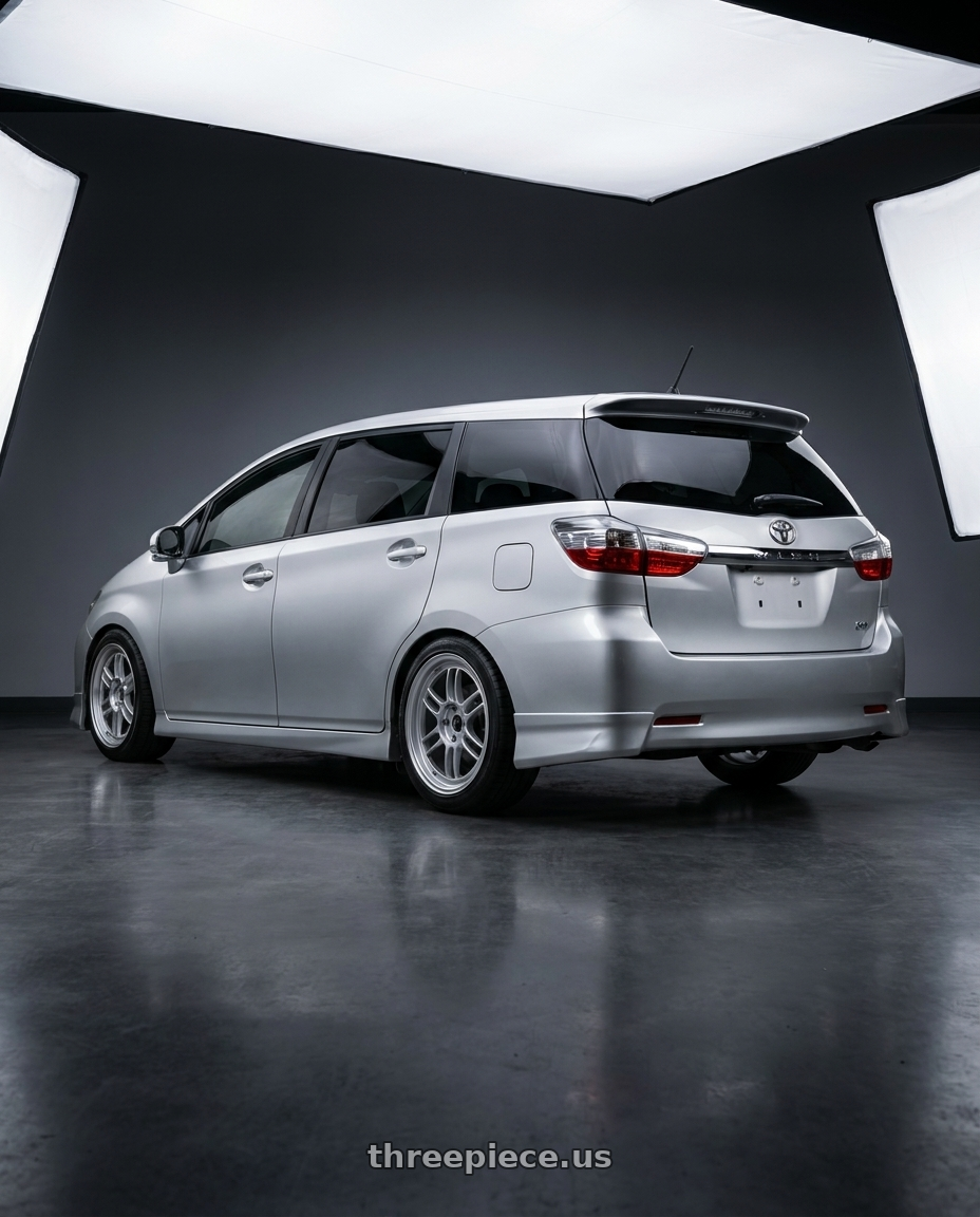 2010 Toyota wish with Enkei RPF1 5x100 17x7.5+48 Silver wheels rear three quarter view square tires