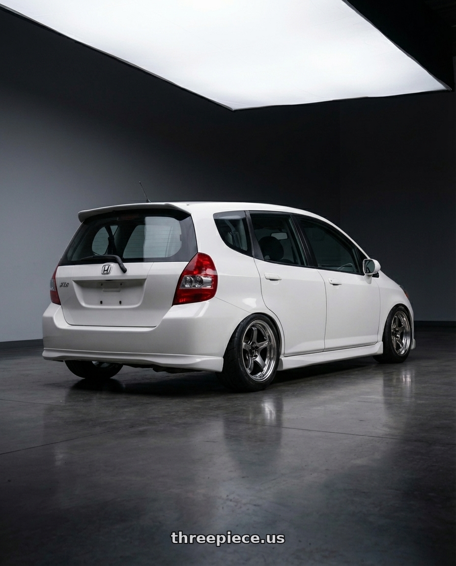 2008 Honda fit  with Advan Racing GT BEYOND 4x100 17x7.0 +38 MACHINING & HYPER PLATINUM BLACK wheels rear three quarter view meaty tires