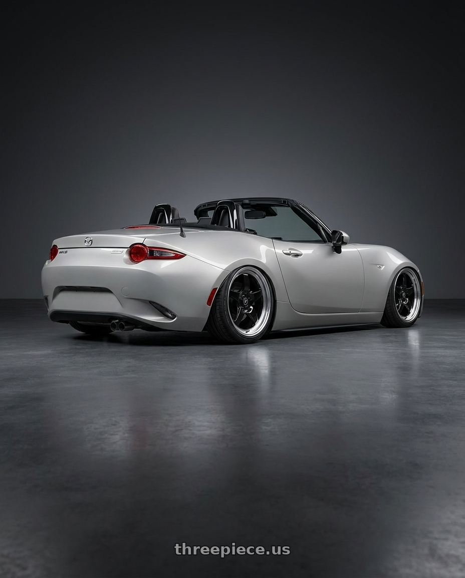 2021 Mazda MX-5 Miata ND with Forgestar D5 Drag 5x114.3 17x10 +50 Gloss Black Machined wheels rear three quarter view slight stretch tires