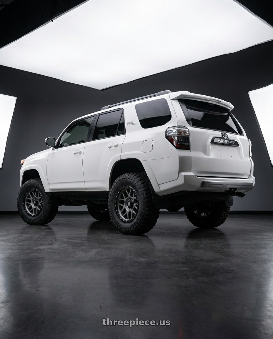 2022 Toyota 4Runner with XD XD127 BULLY 6X139.7 20X9 +0 MATTE GRAY BLACK RING wheels rear three quarter view meaty tires