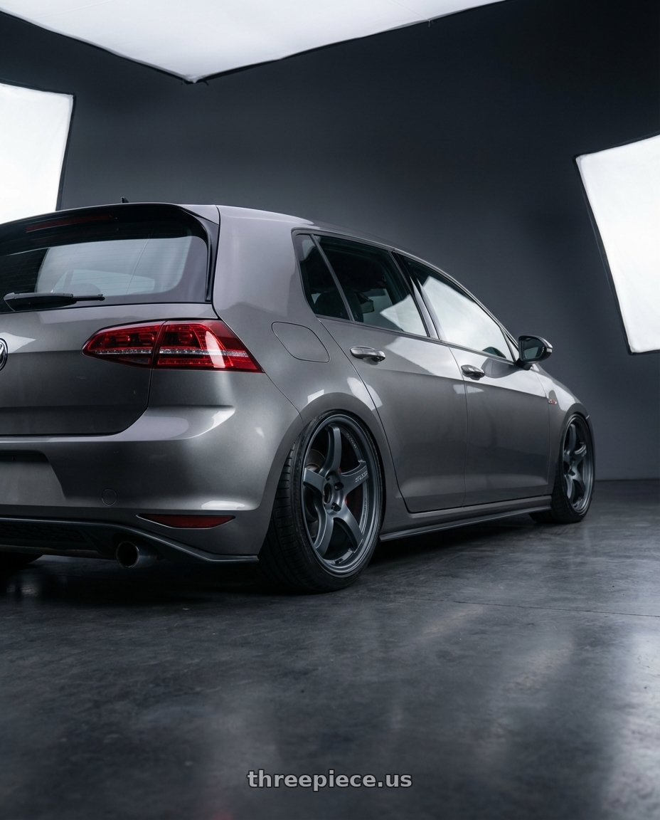 2019 Volkswagen GTI MK7 with Gram Lights 57CR 5x112 19x10.5+22 Gunblue II wheels rear three quarter view slight stretch tires