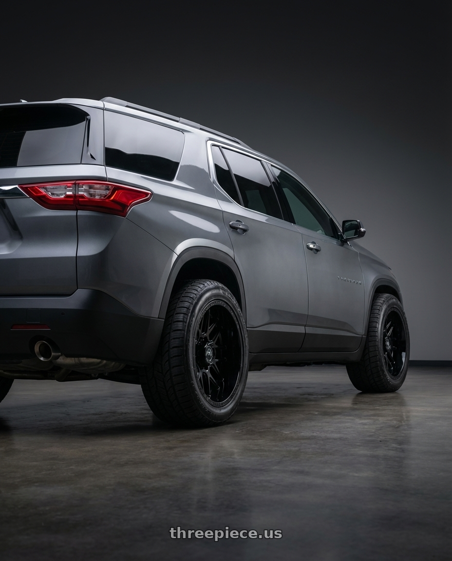 2020 Chevrolet traverse with Motiv Off Road 423B Magnus 5x139.7/5X150 20x12 -44 Gloss Black wheels rear three quarter view meaty tires