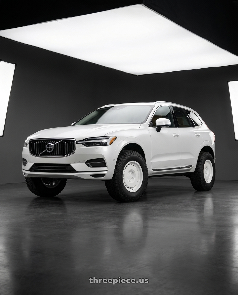 2020 Volvo XC60 with Fifteen52 Evolution MX 5x108 17x8 +38 Classic White wheels front three quarter view lifted stance