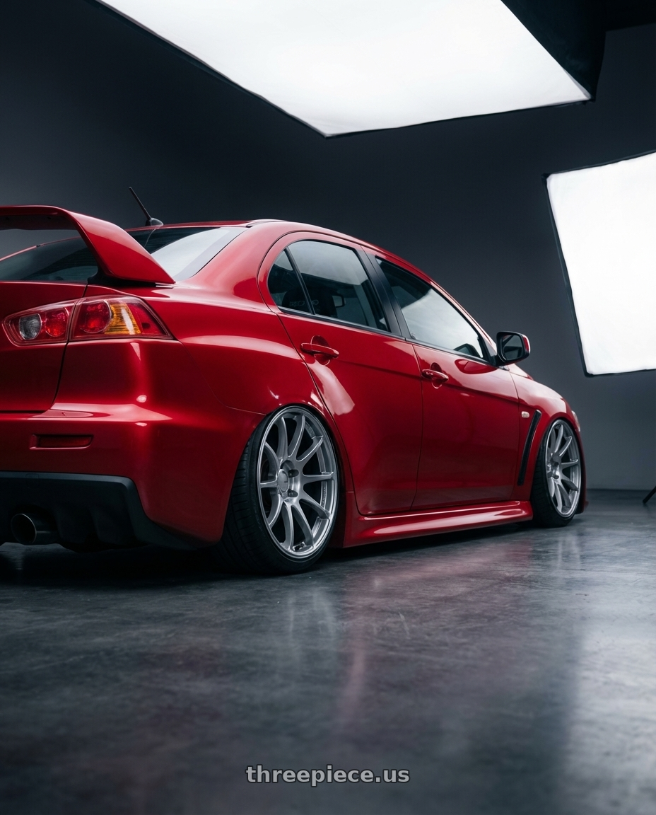 2012 Mitsubishi Lancer Evo X with Ssr Gtv02 5x114.3 18x8.5+40  GLARE SILVER wheels rear three quarter view slight stretch tires