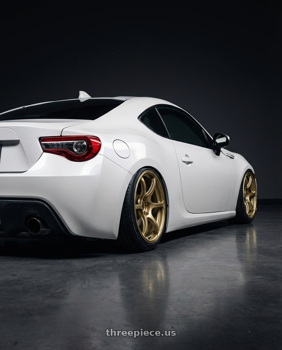 2016 Scion FR-S with Advan RGIII 5x100 18x8.0+47 Gold wheels rear three quarter view slight stretch tires