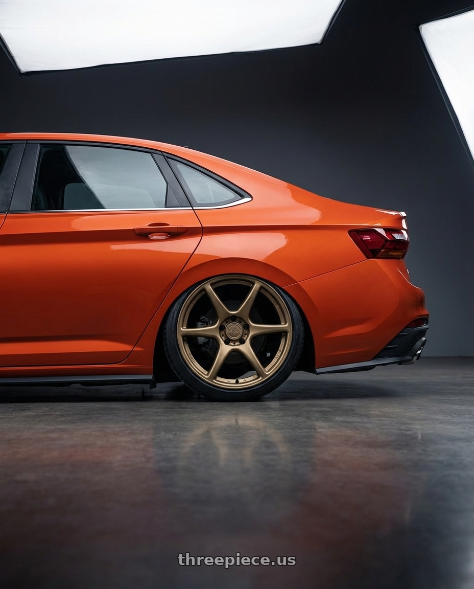 2023 Volkswagen Jetta GLI MK7 with Kansei K11B Tandem 5X112 19x9.5 22 Bronze wheels rear three quarter view slight stretch tires