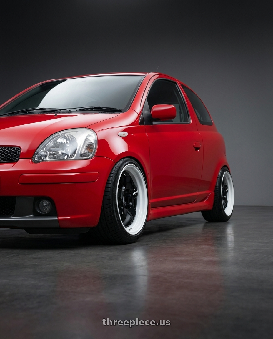 2004 Toyota Yaris T-Sport, Red with Work Meister S1 2P 4x100 15x5.5+38 A Disk Black wheels