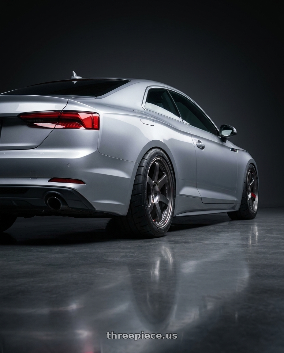 2018 Audi A5 with Volk Racing TE37 SAGA SL 5x112 18x10.5 +30 PRESSED GRAPHITE wheels rear three quarter view meaty tires