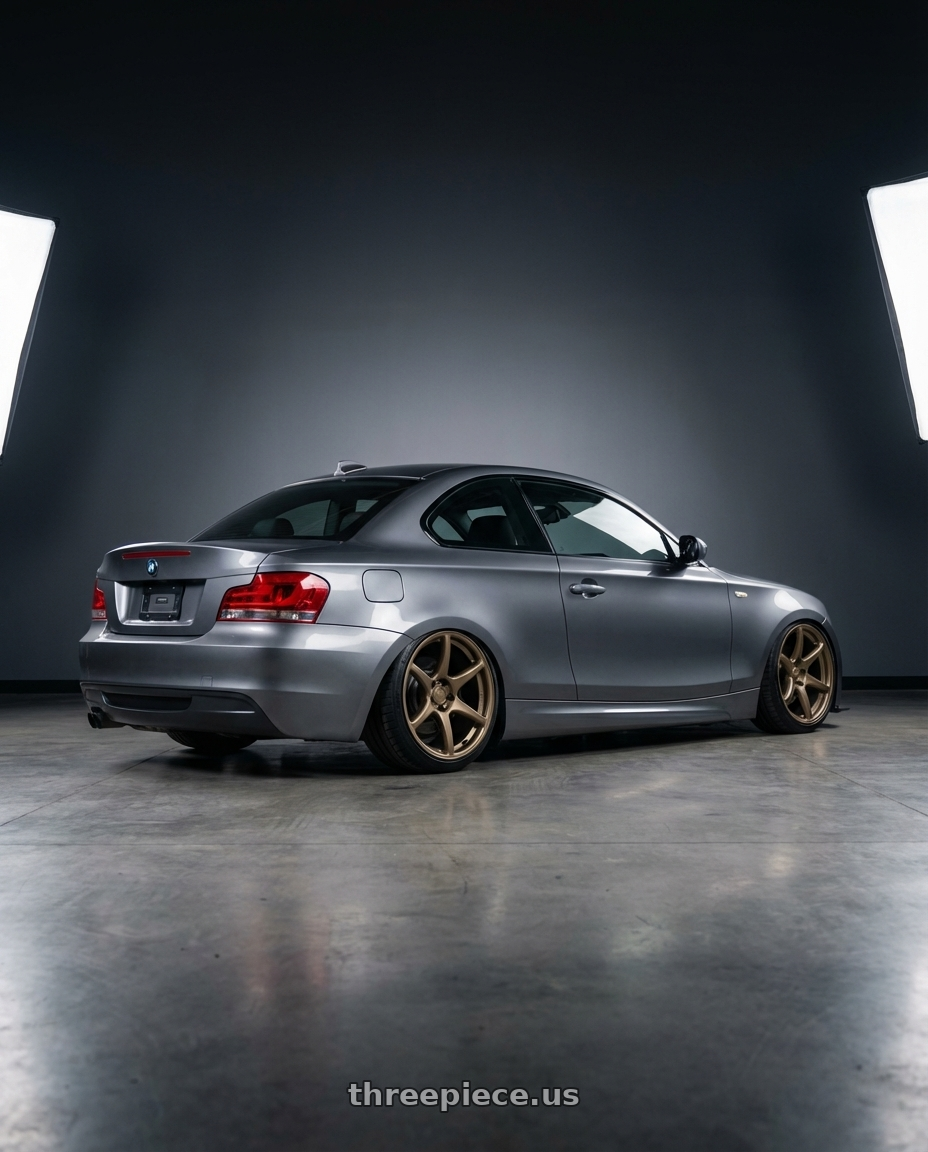 2012 BMW 1 Series E82 with Kansei K11B Tandem 5X120 19x9.5 22 Bronze wheels rear three quarter view slight stretch tires